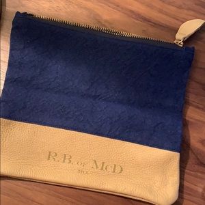 R. B. Of McD canvas & leather clutch.